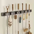 Wall-Mounted Mop and Broom Holder